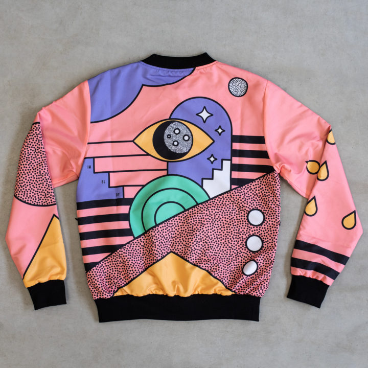 Reversible Jacket. Black on one side. Multicolor Over the Moon Design on the other. Limited Edition.